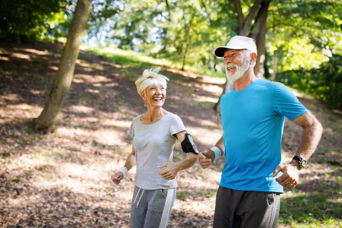 Doctor For Knee Pain - happy couple on a jog together