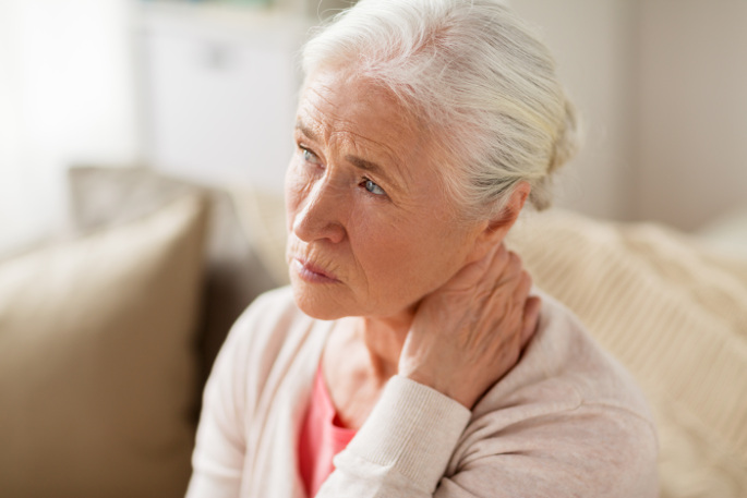 Trigger Point Injections - woman suffering from neck pain